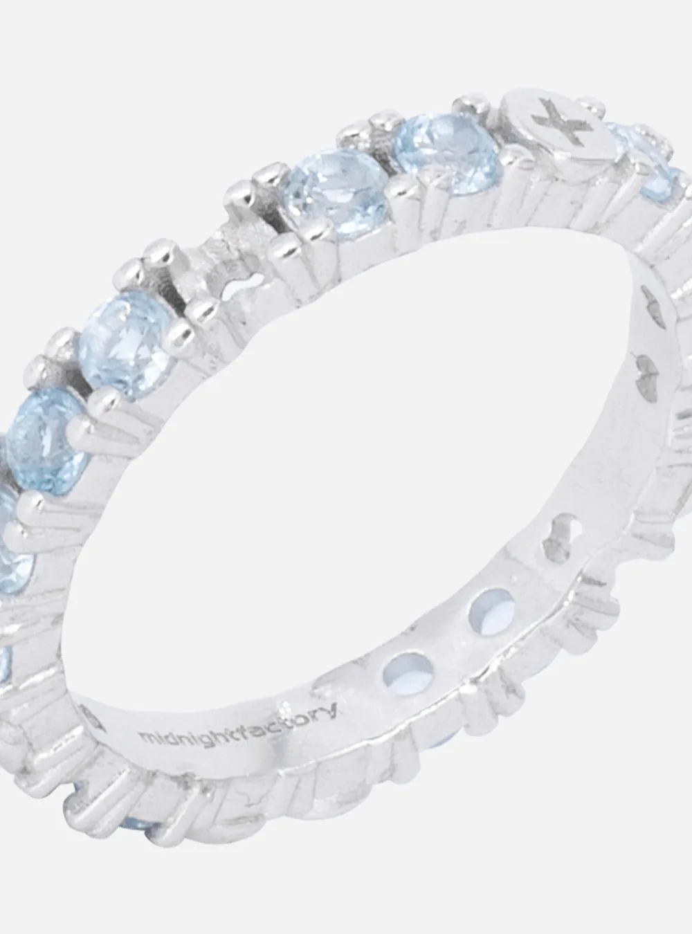 Broken eternity ring with topaz